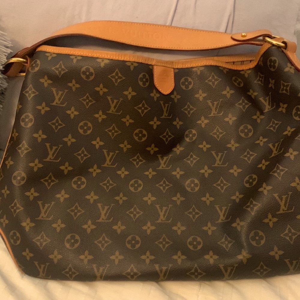 Authentic barely used classic Monogrammed Delightful Louis Vuitton!!